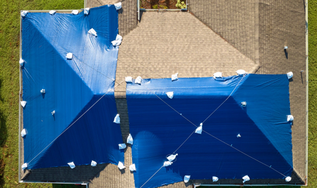 Tarping 101: A Homeowner’s Guide to Roof Protection